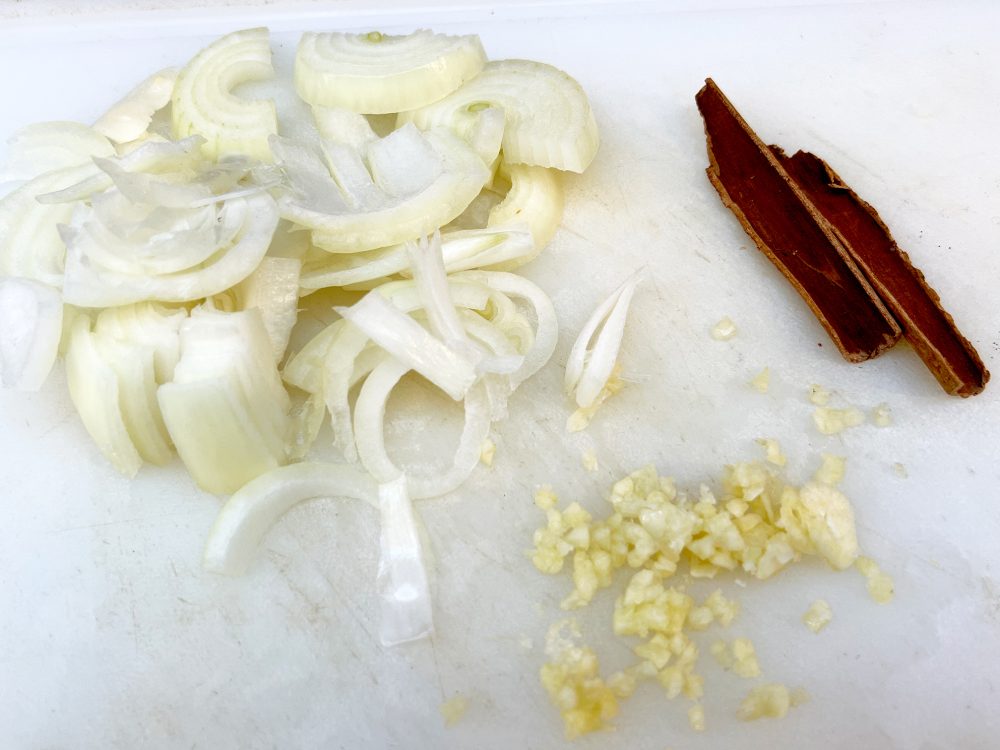 Chopped onions, garlic and cinnamon stick